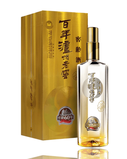 Alcohol bottle and packaging with gold accents on a white background