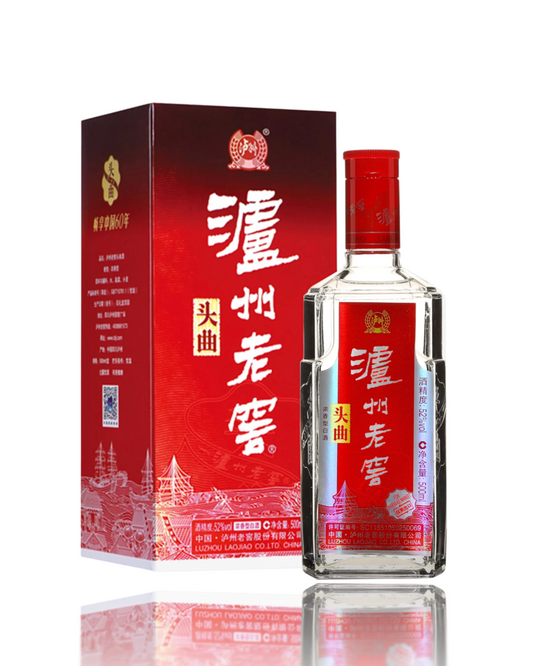 Bottle and box of Liang Zhou Laowai white wine on a white background