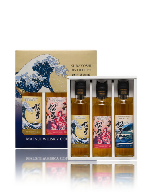 Set of Matsui Whisky bottles with decorative box featuring wave design and Kurayoshi Distillery branding.