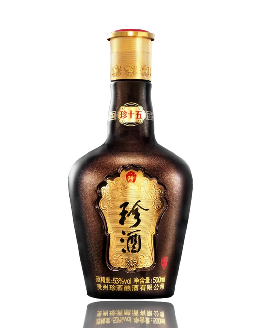 Bottle of Jieniu liquor with gold cap on a white background